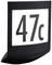 Świecący numer domu '47c' na czarnym tle.