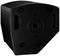 Czarny, trójkątny głośnik w ciemnym otoczeniu, z czterema otworami mocującymi i centralnym otworem pośrodku.