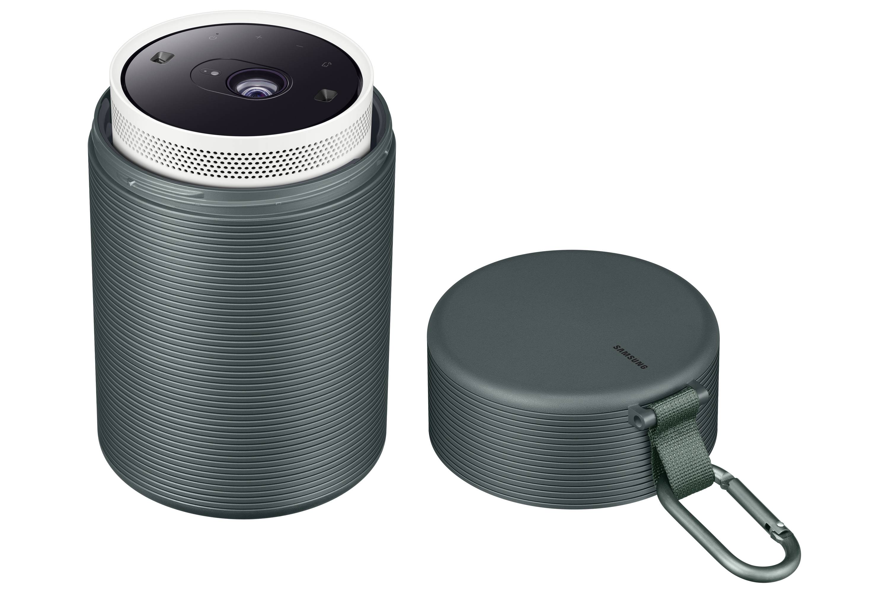 Przenośny, ciemnozielony projektor z zdejmowaną pokrywą i haczykiem karabińcowym, idealny do podróży.