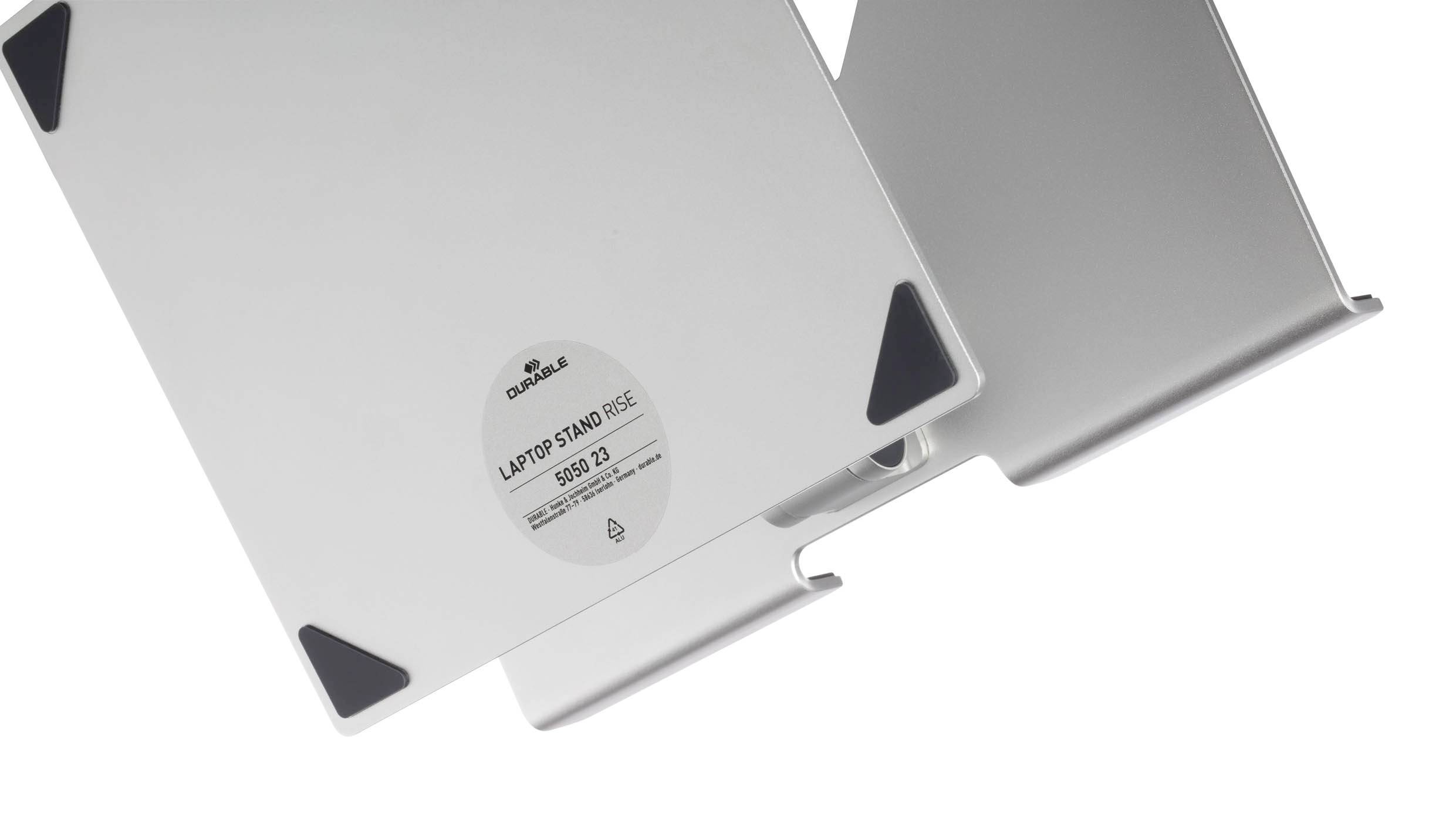 Stojak na laptopa z metalu z czarną, antypoślizgową osłoną narożną, naklejka pośrodku przedstawia markę i informacje o modelu.
