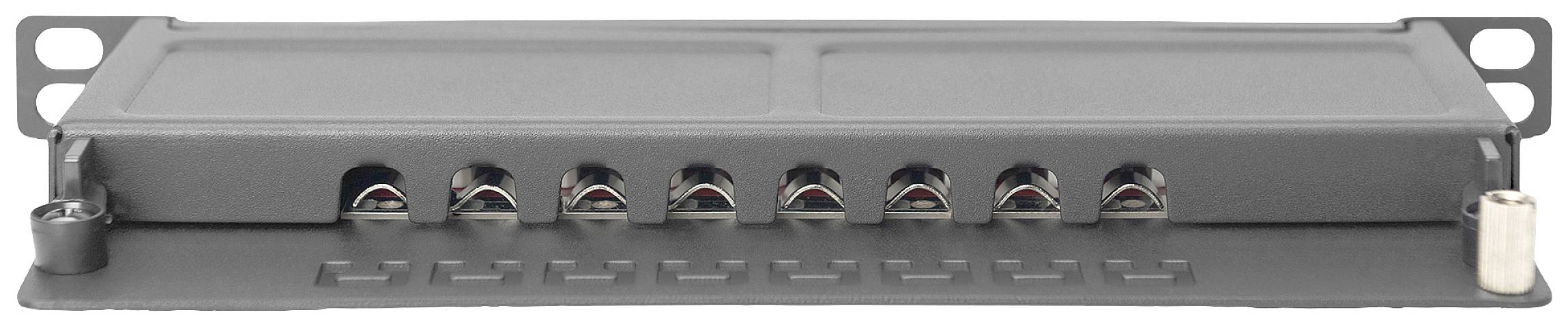 Zbliżenie szarej metalowej obudowy z wieloma złączami.