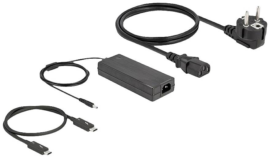 Ładowarka do komputera z różnymi kablami: przewód zasilający z wtyczką, kabel ładujący z adapterem oraz dwa kable USB-C.