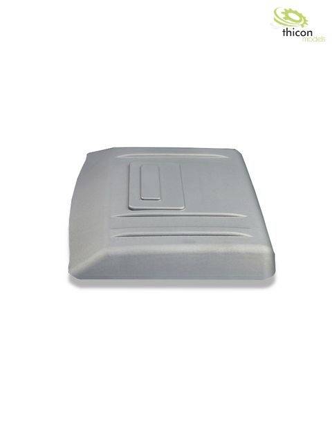 Prostokątny szary element plastikowy z wypukłą strukturą na górnej powierzchni, logo firmy 'thicon' w prawym górnym rogu obrazu.