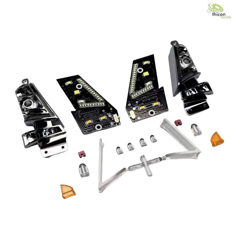 Elementy modelarskie do przebudowy kabiny ciężarówki, składające się z różnych komponentów z tworzyw sztucznych i metalu, oraz kolorowych części do dostosowania.