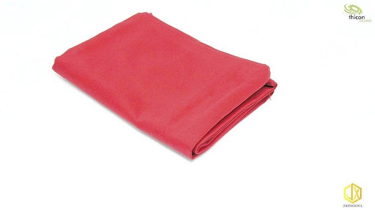 Na białej powierzchni leży złożona czerwona tkanina. W prawym górnym i prawym dolnym rogu widoczne są dwa logotypy.