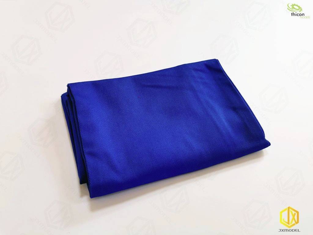 Złożona, niebieska tkanina leży na białej powierzchni. W prawym górnym rogu logo 'thicon', w prawym dolnym rogu logo '3Dmodel'.