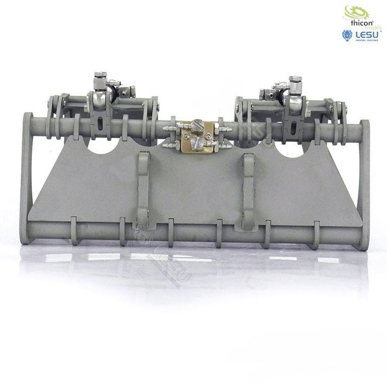 Szary metalowy przedmiot z wieloma ruchomymi komponentami i częściami mechanicznymi, prawdopodobnie część maszyny lub nasadka narzędziowa.