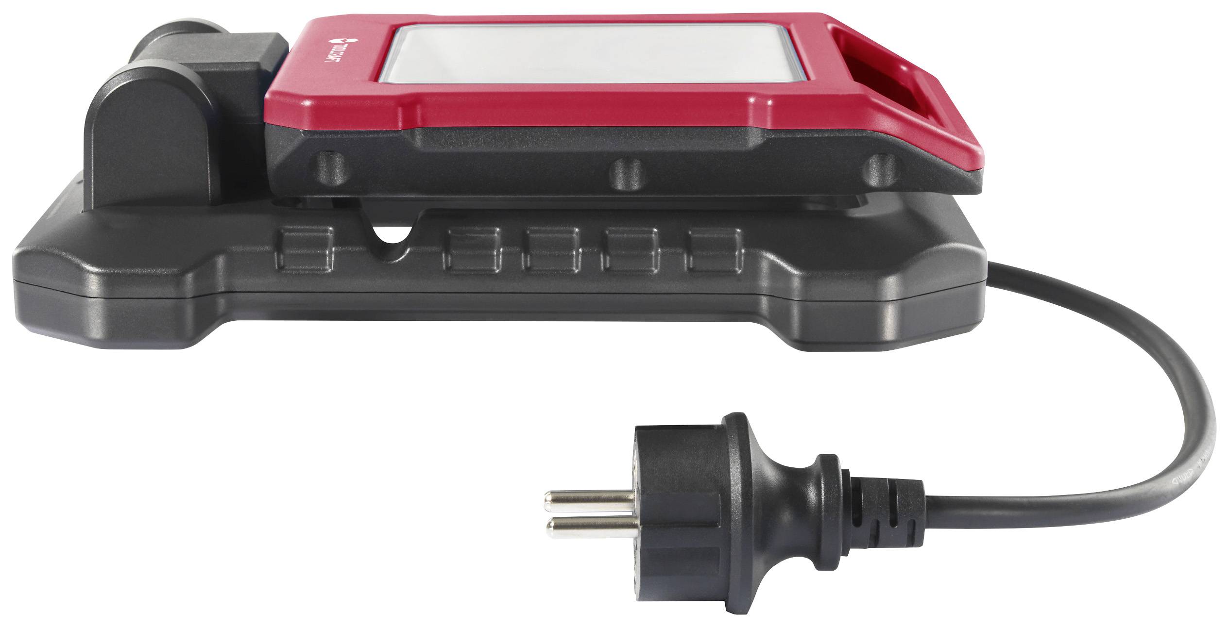 Czerwono-czarna ładowarka z przewodem i wtyczką, leżąca na stabilnej podstawie, prezentuje techniczny design i funkcjonalność.