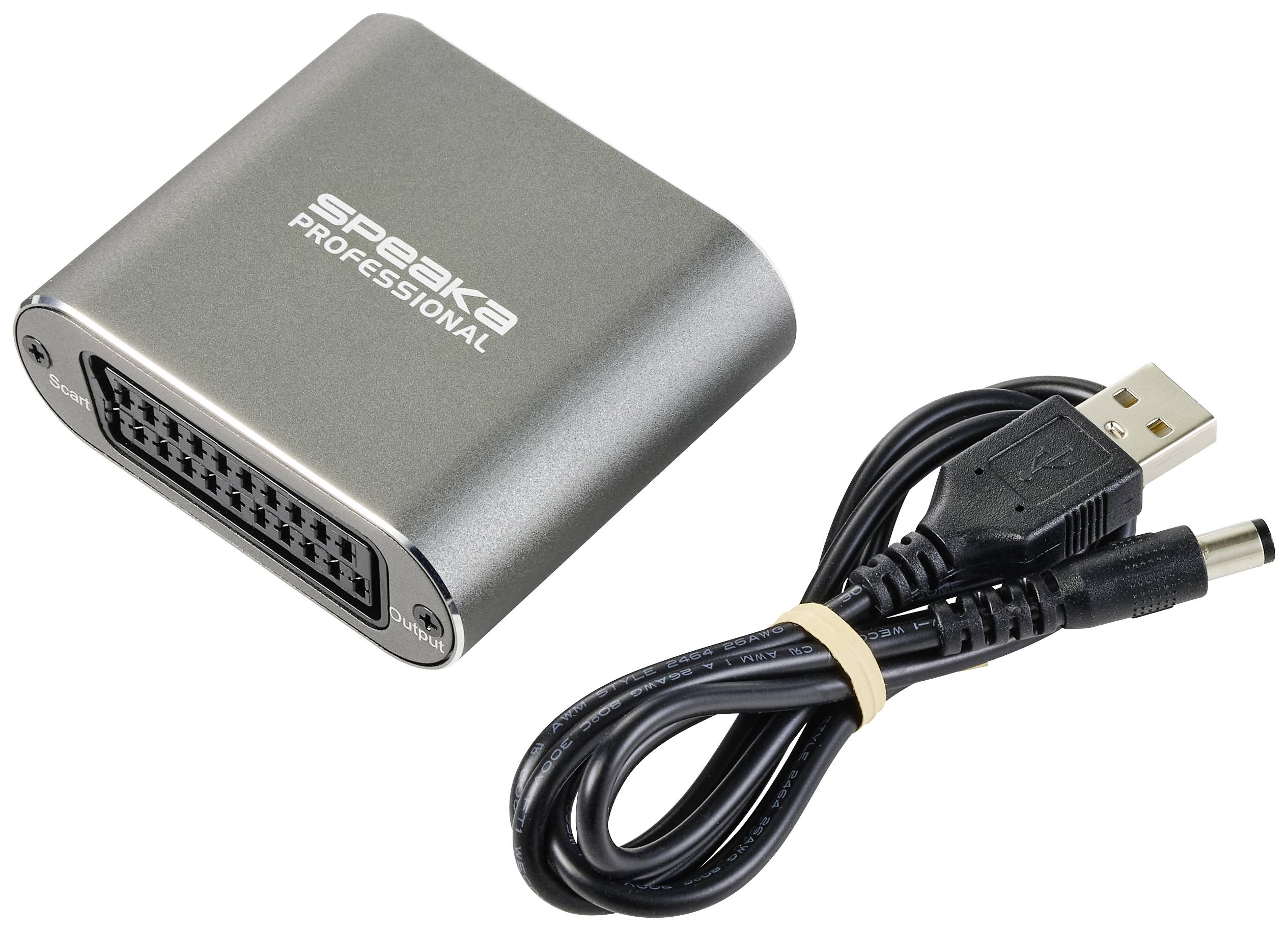Adapter z gniazdem SCART i kablem USB do zasilania. Oznaczenie 'Speaka Professional' na obudowie.