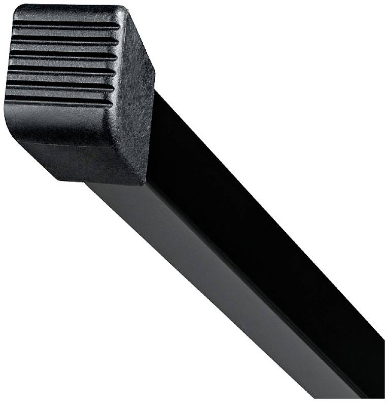 Czarny metalowy słup zakończony żebrowaną plastikową nasadką, umieszczony skośnie w górę na białym tle.