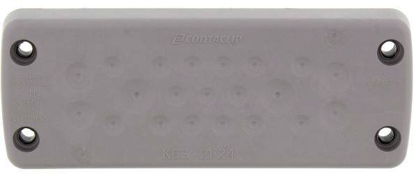 Szara plastikowa nakładka z czterema otworami na śruby w narożnikach. Pośrodku widoczne są wypustki, prawdopodobnie do prowadzenia kabli lub ich zabezpieczenia.