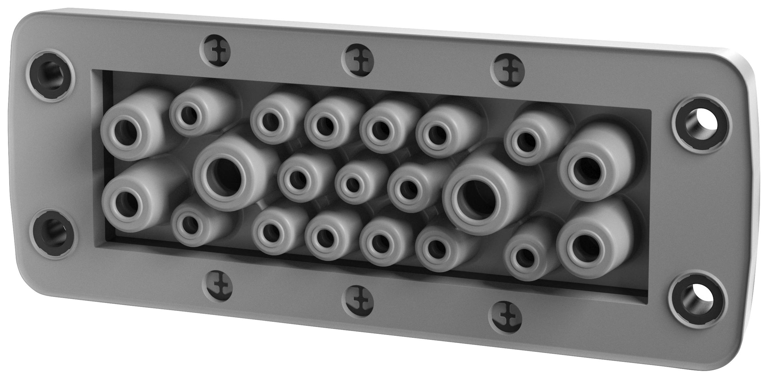 Prostokątna obudowa z wieloma okrągłymi otworami o różnych rozmiarach, ułożonymi w uporządkowanej strukturze, przymocowana śrubami.