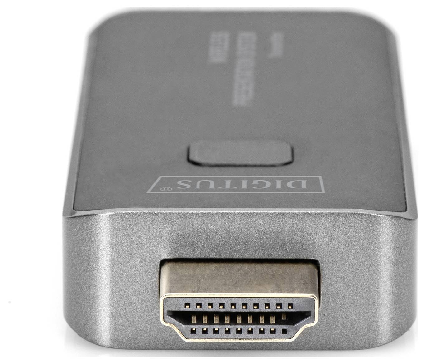 Srebrny adapter HDMI o prostokątnym kształcie z wyraźnym interfejsem HDMI z przodu.