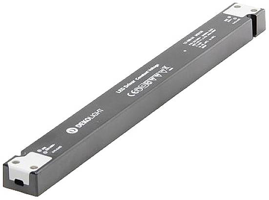 Smukły, prostokątny sterownik LED firmy DEKOLIGHT, przeznaczony do zasilania lamp LED. Obudowa w kolorze ciemnoszarym z białym napisem.