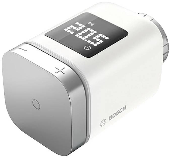 Elektroniczny termostat grzejnikowy w kolorze białym z wyświetlaczem cyfrowym pokazującym '20,5°C'.