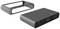 Zewnętrzna obudowa dysku twardego z złączami USB-C i USB-A, w czarnym aluminiowym designie, z wyjmowalną ramką obok.