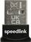 Mały adapter USB z napisem 'speedlink'. Na górze znajdują się symbole przedstawiające przekreślony kosz na śmieci oraz litery 'UKCA'.