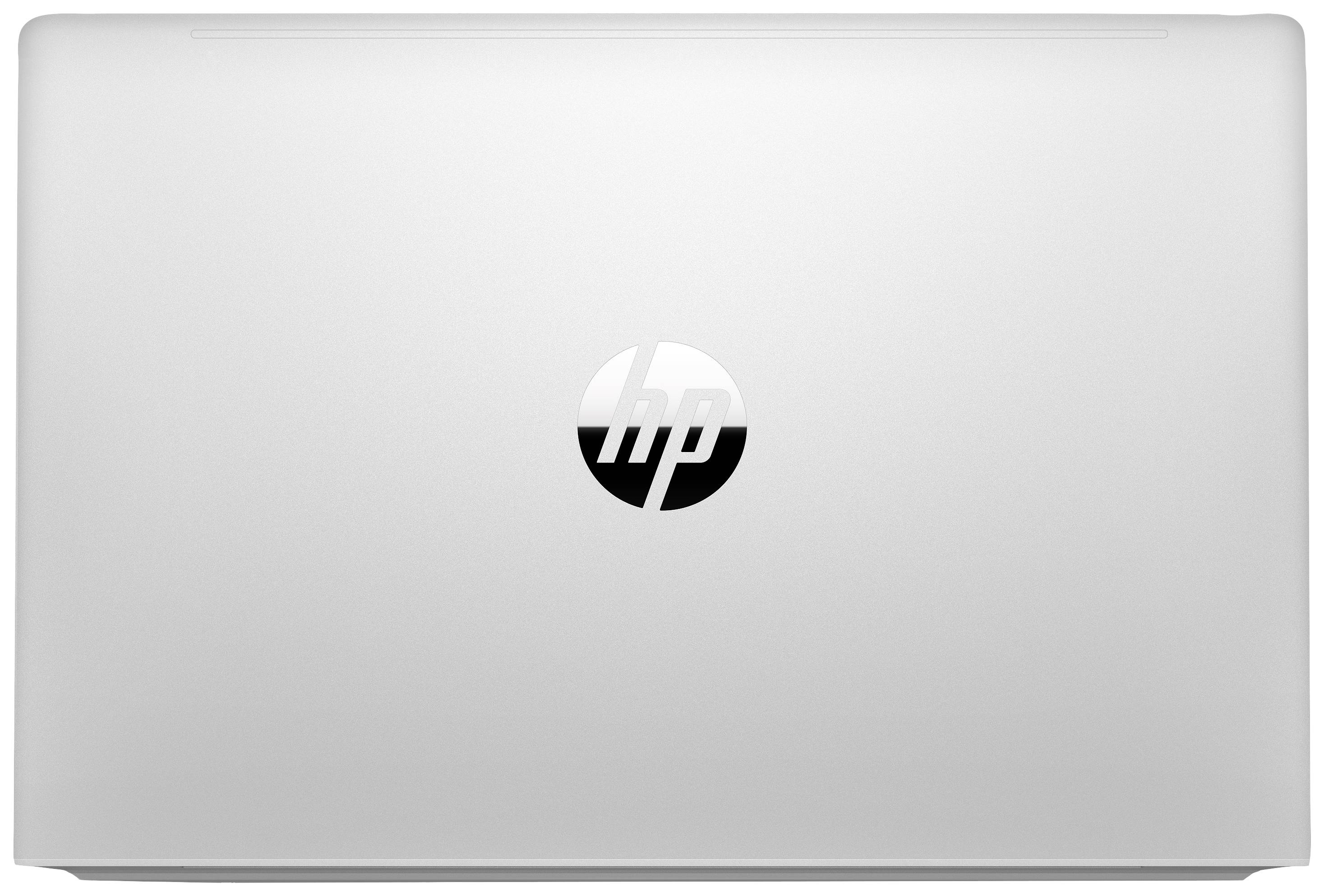 Pokrywa laptopa z logo popularnej marki komputerowej pośrodku. Pokrywa jest srebrna i o minimalistycznym designie.