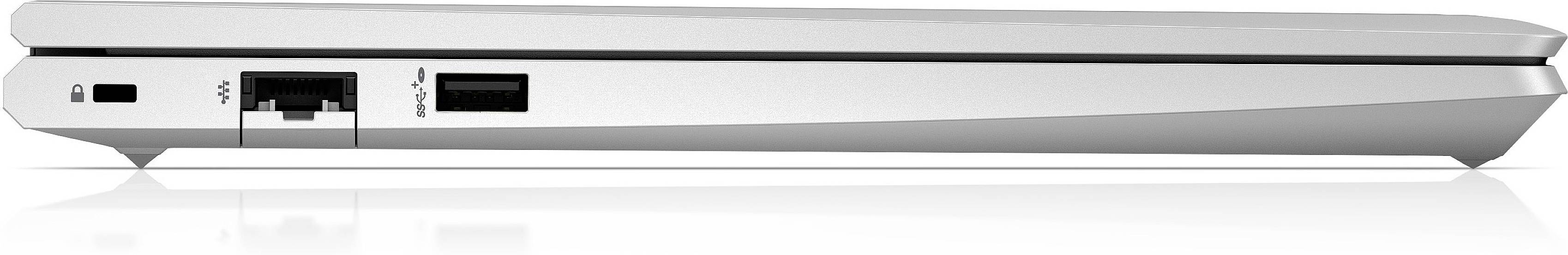 Widok z boku laptopa z portami Ethernet i USB, otwartego pod małym kątem.