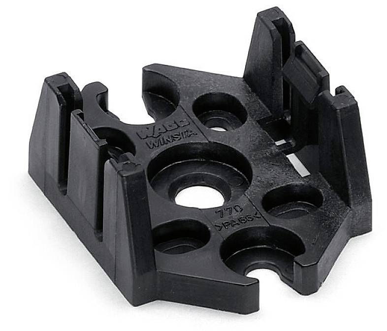 Czarny plastikowy uchwyt z wieloma otworami o kształcie kołowym i prostokątnym, stosowany do mocowania elementów elektronicznych.