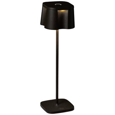 Czarna lampa stojąca z kwadratowym, zaokrąglonym kloszem i płaską podstawą. Źródło światła LED świeci w dół.