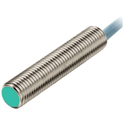 Cylindryczny, żebrowany cylinder metalowy z zielonym końcem i niebieskim przewodem, prawdopodobnie czujnik lub element elektroniczny.