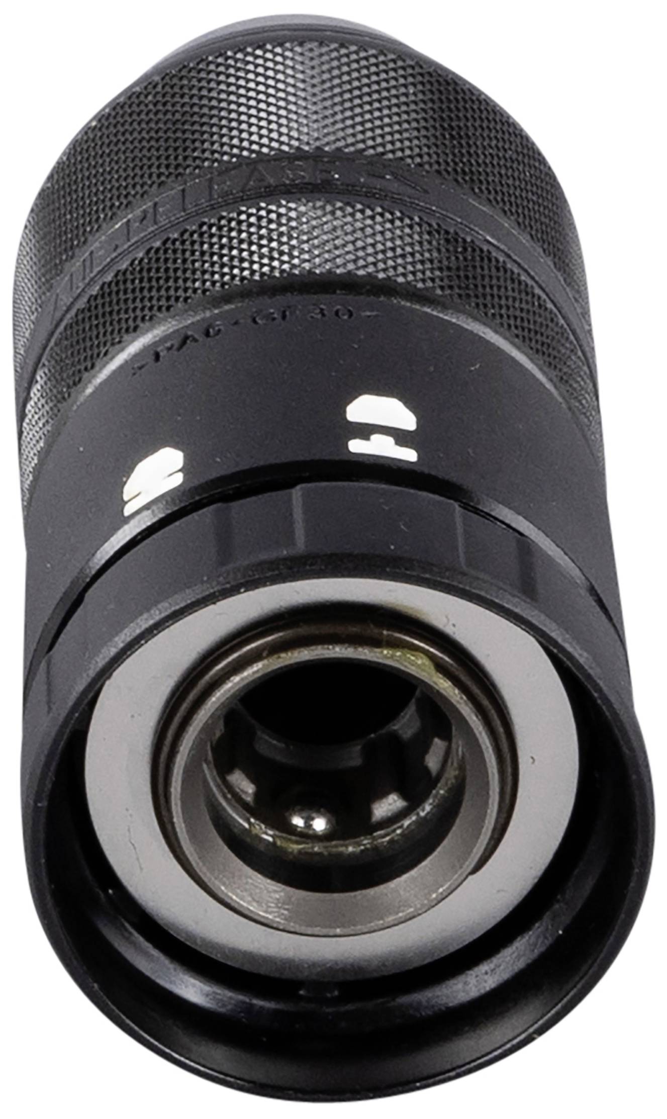 Zbliżenie czarnego, cylindrycznego narzędzia z żłobionym uchwytem i srebrnym metalowym pierścieniem. Przeznaczone głównie do zastosowań technicznych.