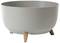 Szary, okrągły doniczka z trzema małymi drewnianymi nóżkami, odpowiednia do dekoracji wnętrz lub na zewnątrz.