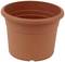 Okrągły, pusty, pomarańczowy doniczka z plastiku o gładkiej powierzchni.
