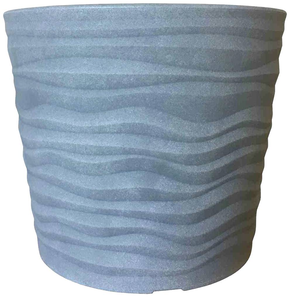 Niebieski doniczka z falistym wzorem.