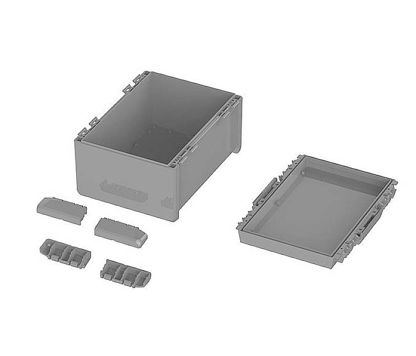 Prostokątny szary pojemnik z zdejmowaną pokrywką, obok niego trzy małe prostokątne elementy.