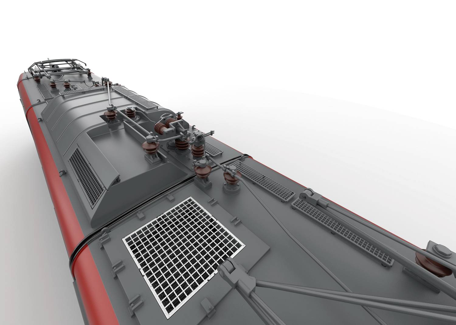 Szary i czerwony dach wagonu kolejowego z metalowymi elementami i kratami ułożonymi w stylu przemysłowym.