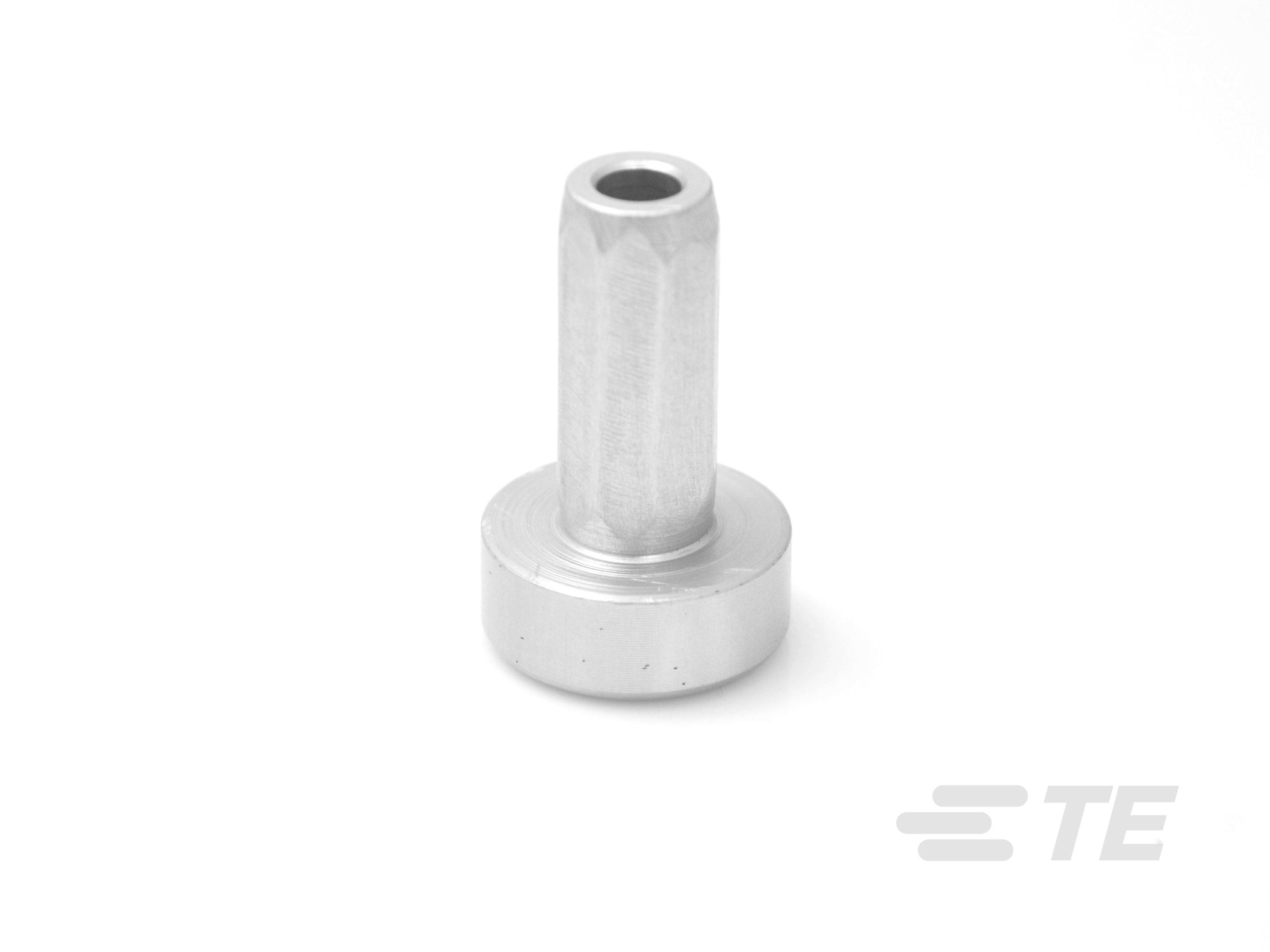 Metalowy cylindryczny adapter z szeroką, płaską podstawą i wąskim, wydłużonym trzpieniem.
