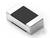 Obraz małego, prostokątnego elementu elektronicznego z metalowymi końcówkami, prawdopodobnie rezystor SMD.