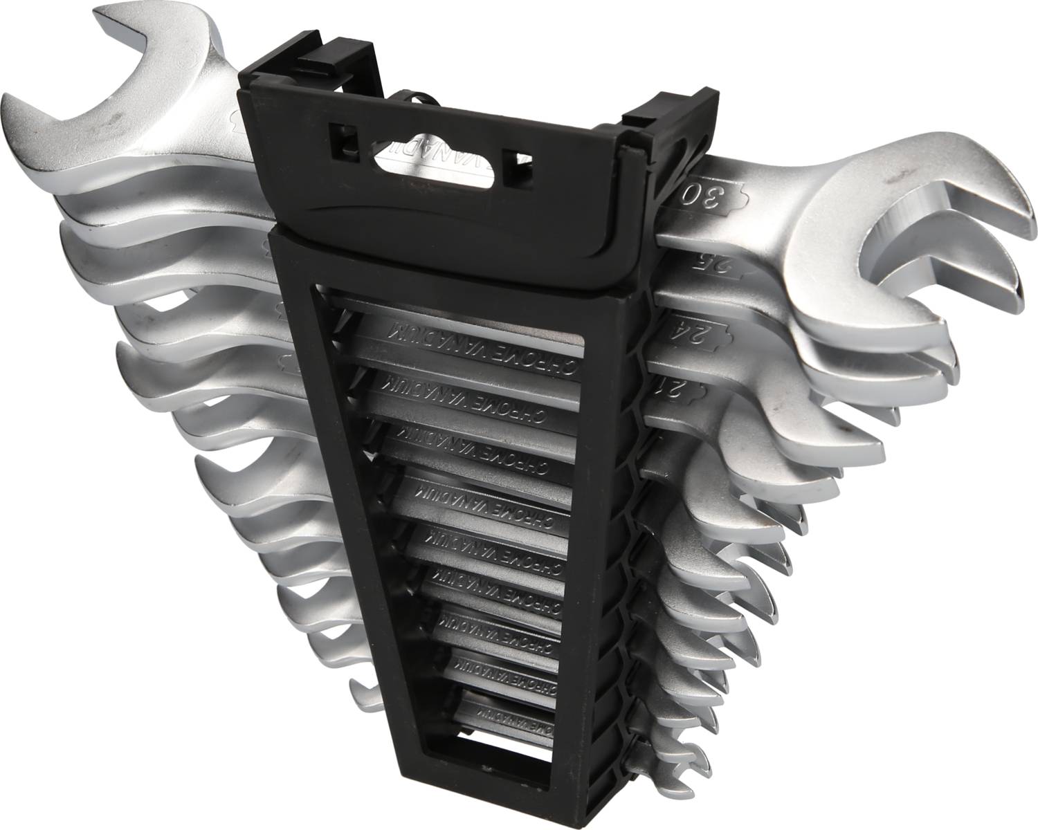 Zestaw dziewięciu srebrnych kluczy płaskich w czarnym plastikowym stojaku, ułożonych według rozmiaru.