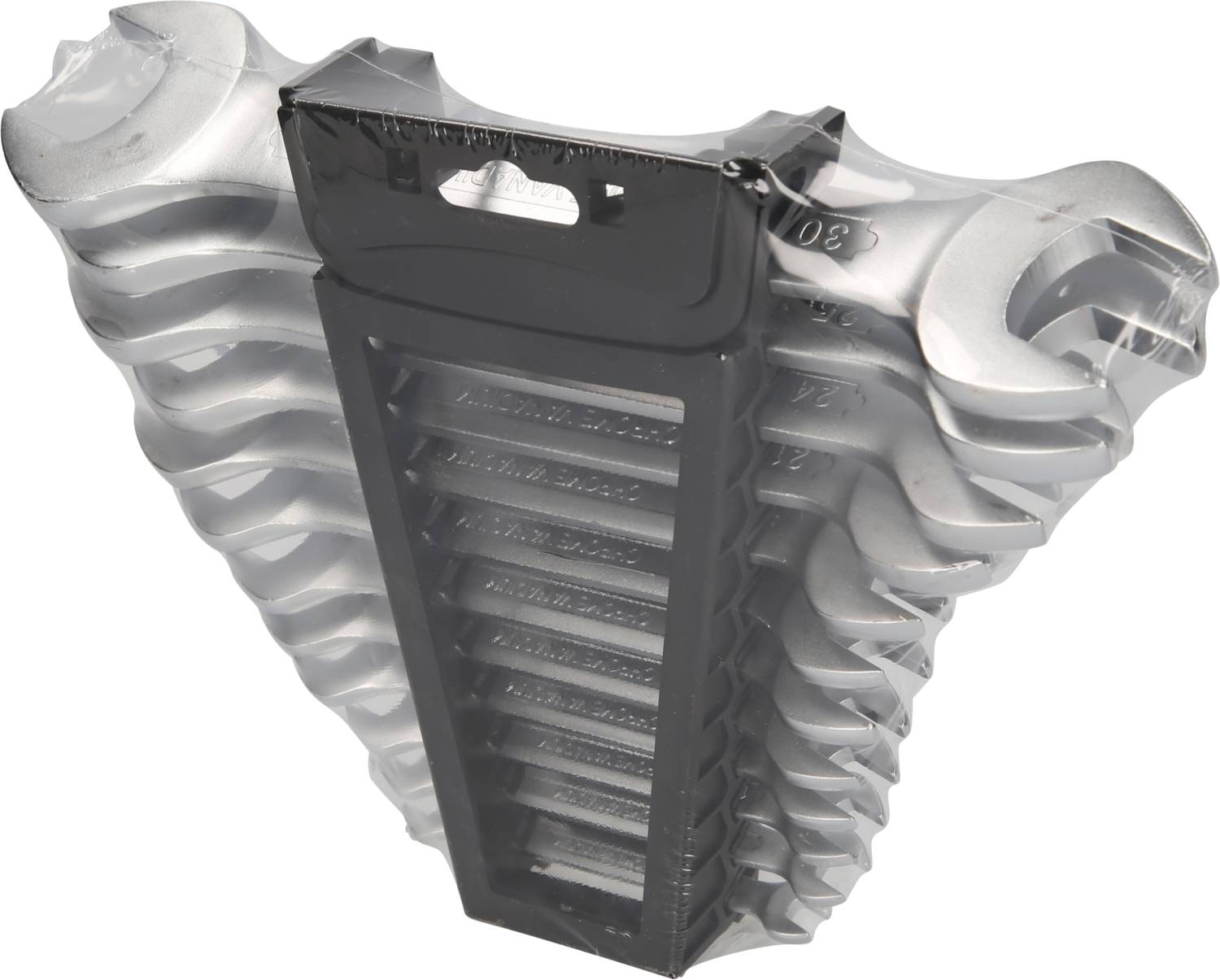 Zestaw dziewięciu chromowanych kluczy płaskich w różnych rozmiarach, ułożonych w plastikowym opakowaniu.