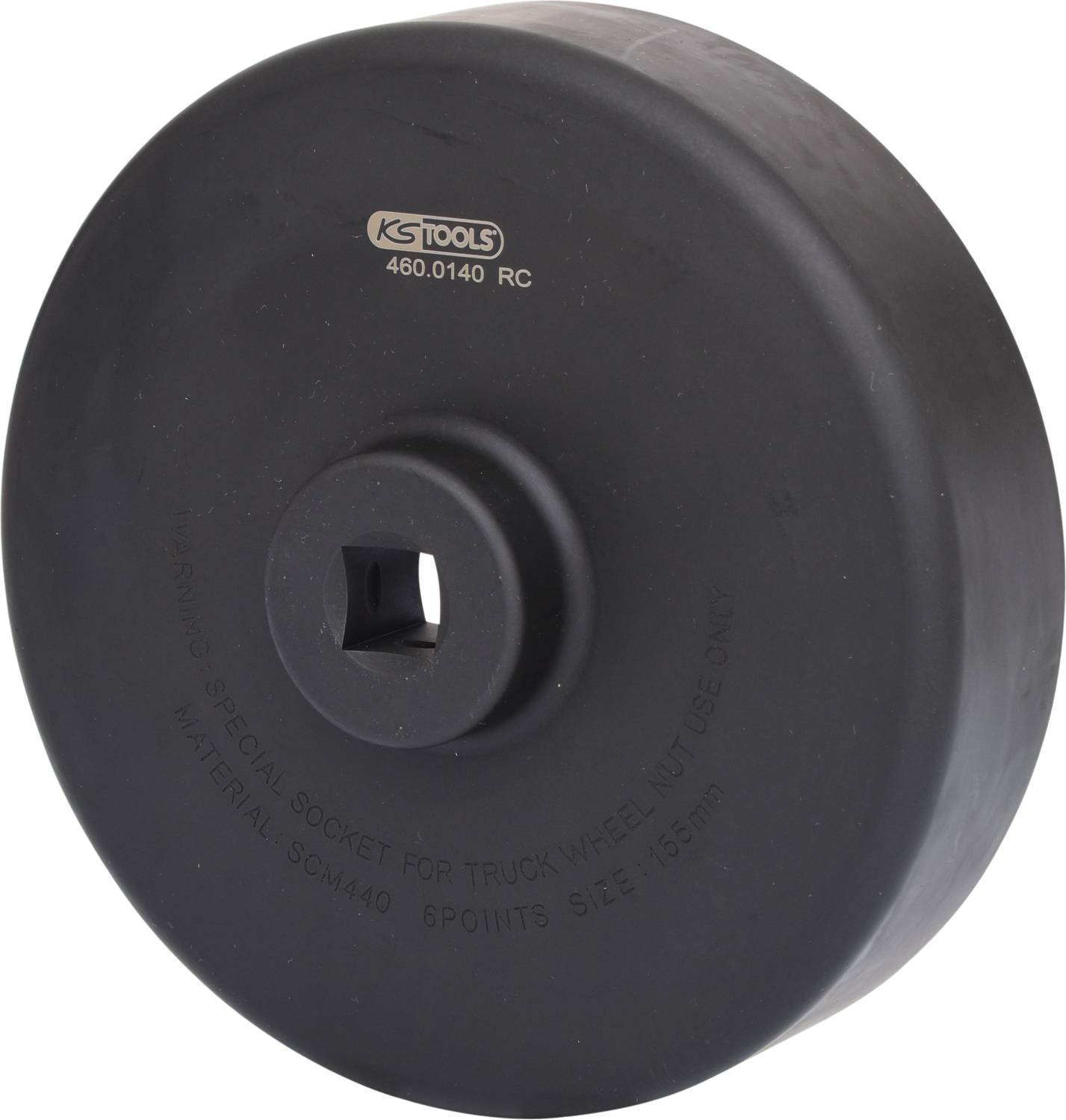 Duży, okrągły, czarny klucz nasadowy firmy KS Tools, specjalnie przeznaczony do kół ciężarówek. Napis: 'Specjalna grzechotka do nakrętek kół ciężarówek'.