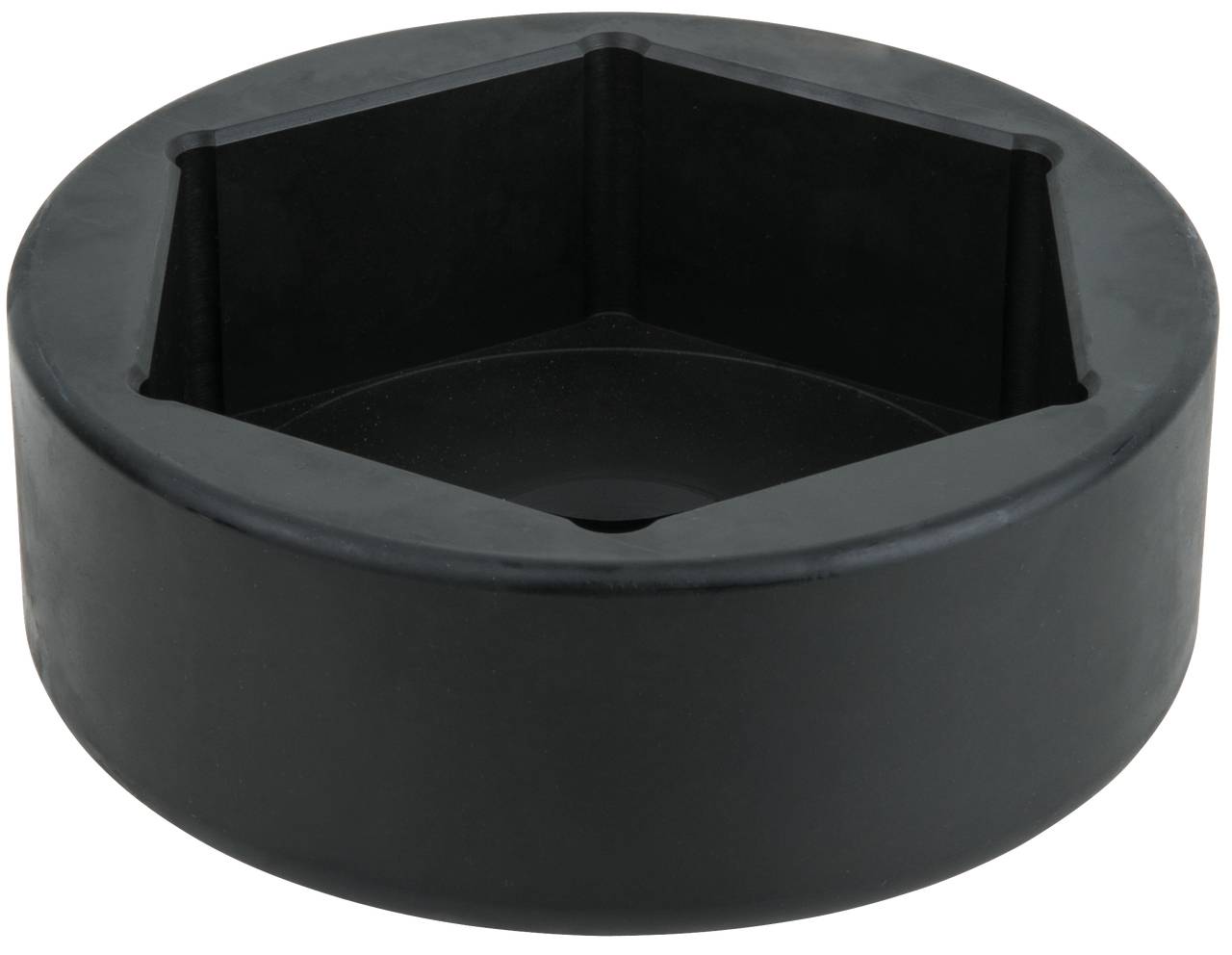 Czarny, pięciokątny adapter, prawdopodobnie element narzędziowy, leży na białej powierzchni.