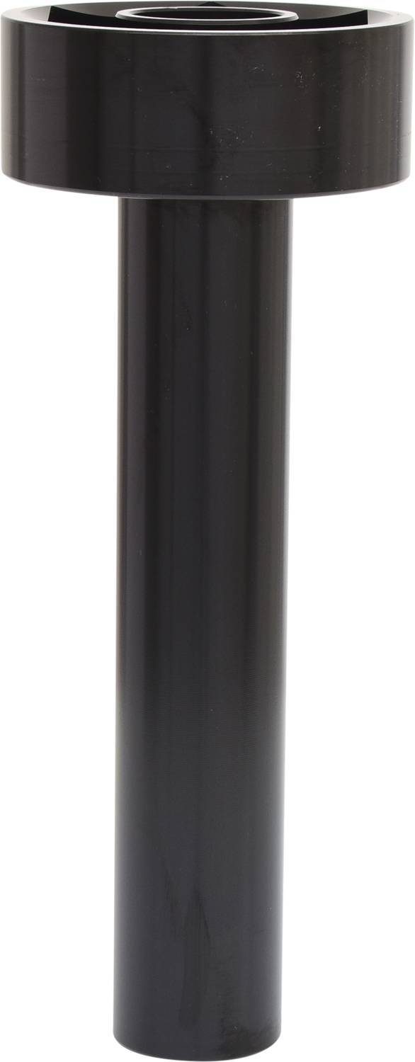 Czarny, cylindryczny element metalowy z szeroką główką, prawdopodobnie element maszyny lub część mocująca.