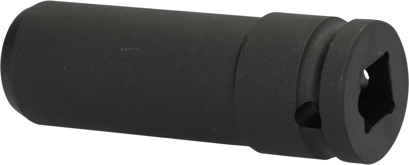Czarny, cylindryczny element narzędziowy, prawdopodobnie nasadka klucza, spoczywa na białej powierzchni.