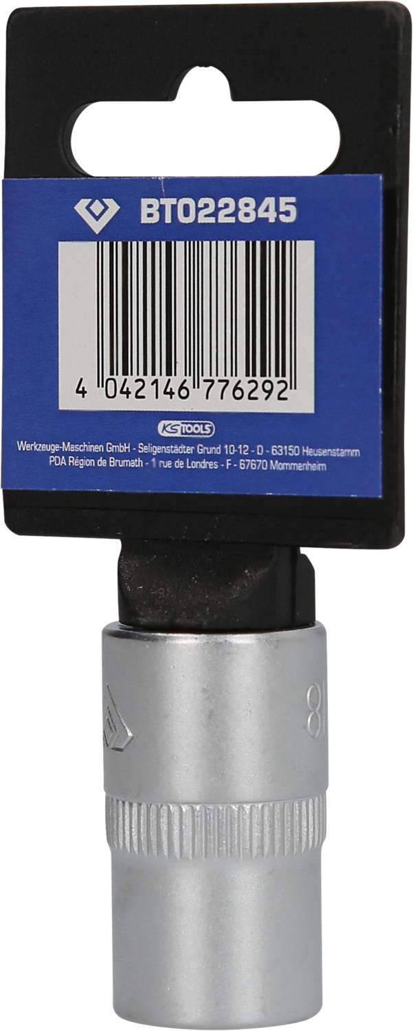 Metalowy łącznik sześciokątny z napisem 'BT022845'. Opakowanie z niebieską etykietą i kodem kreskowym. Narzędzie firmy Vigor.