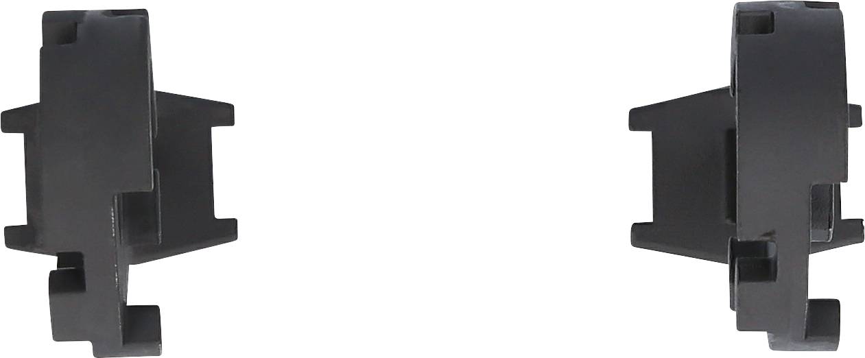 Dwie czarne, wzajemnie zazębiające się części z tworzywa sztucznego, przeznaczone do stosowania w zastosowaniach technicznych lub przemysłowych.