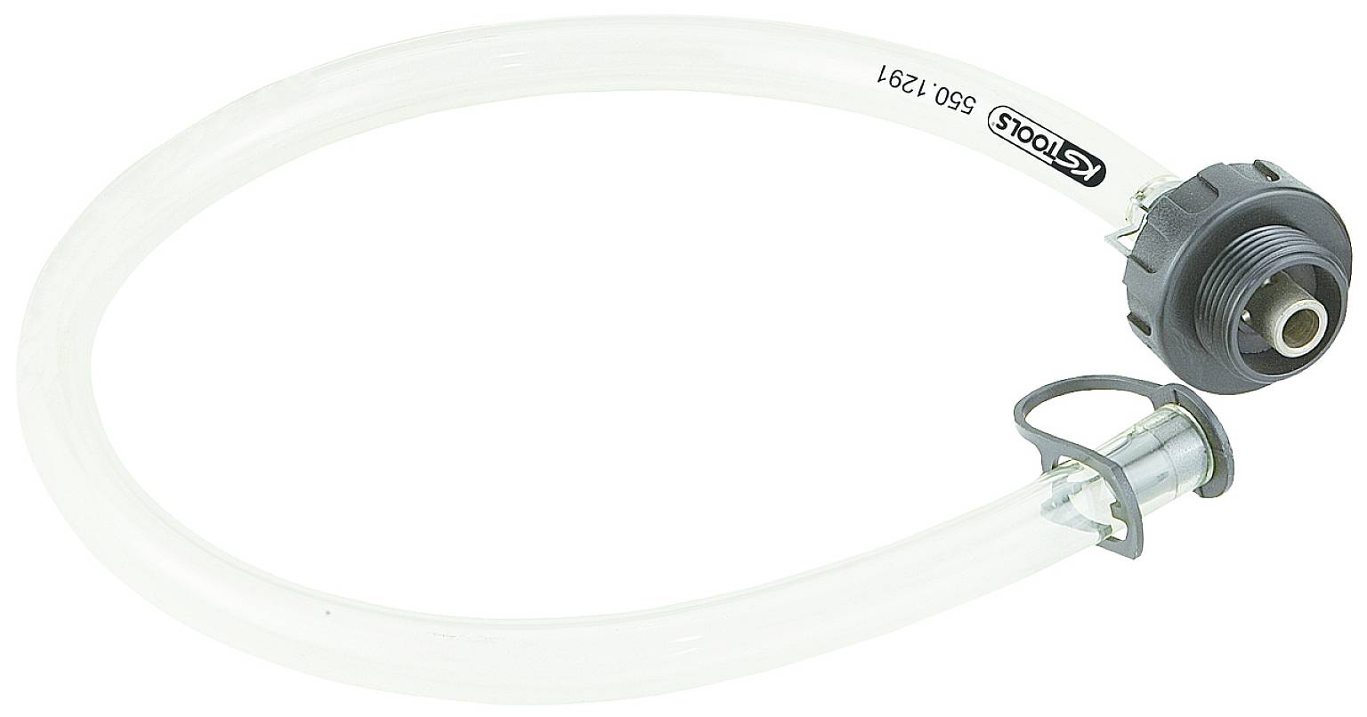 Przezroczysty przewód z czarnym adapterem i metalowym zaciskiem. Prawdopodobnie element narzędzia lub maszyny.