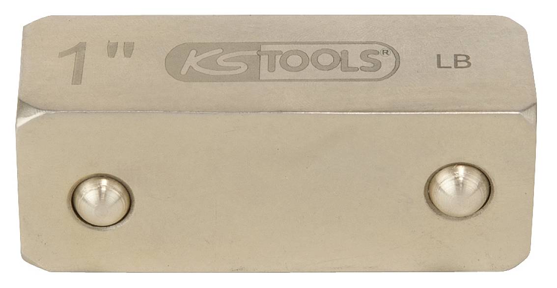 Metalowy sześcian w kolorze beżowym z grawerem '1" KS TOOLS LB', prawdopodobnie wzorzec pomiarowy lub element narzędzia.