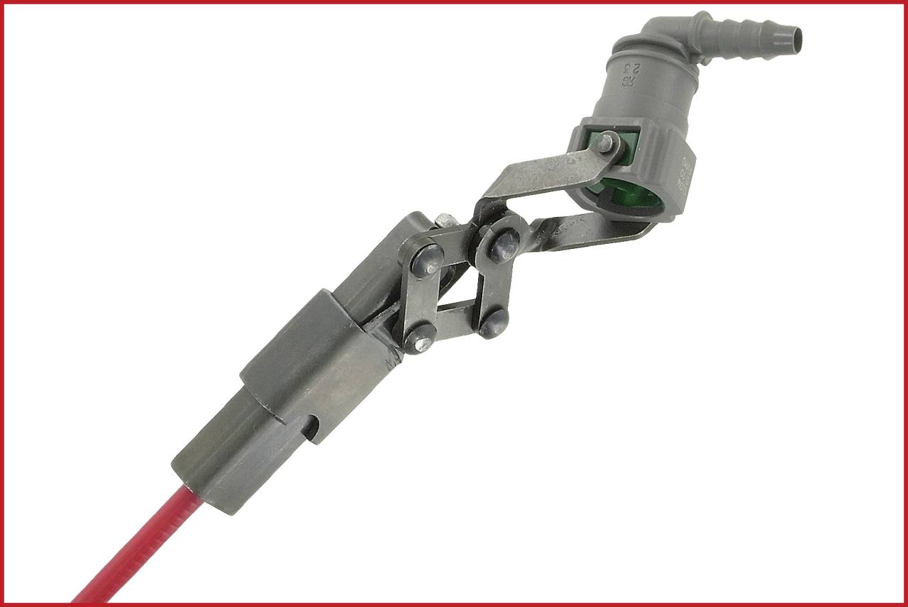 Metalowe narzędzie z mechanizmem przegubowym, zamontowane na czerwonym pręcie. Stosowane do precyzyjnych zastosowań mechanicznych.