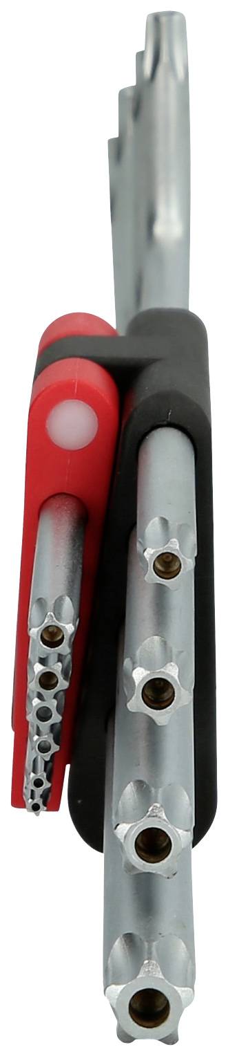 Zbliżenie zestawu kluczy imbusowych różnej wielkości, częściowo zamocowanych w czerwonym i czarnym uchwycie.