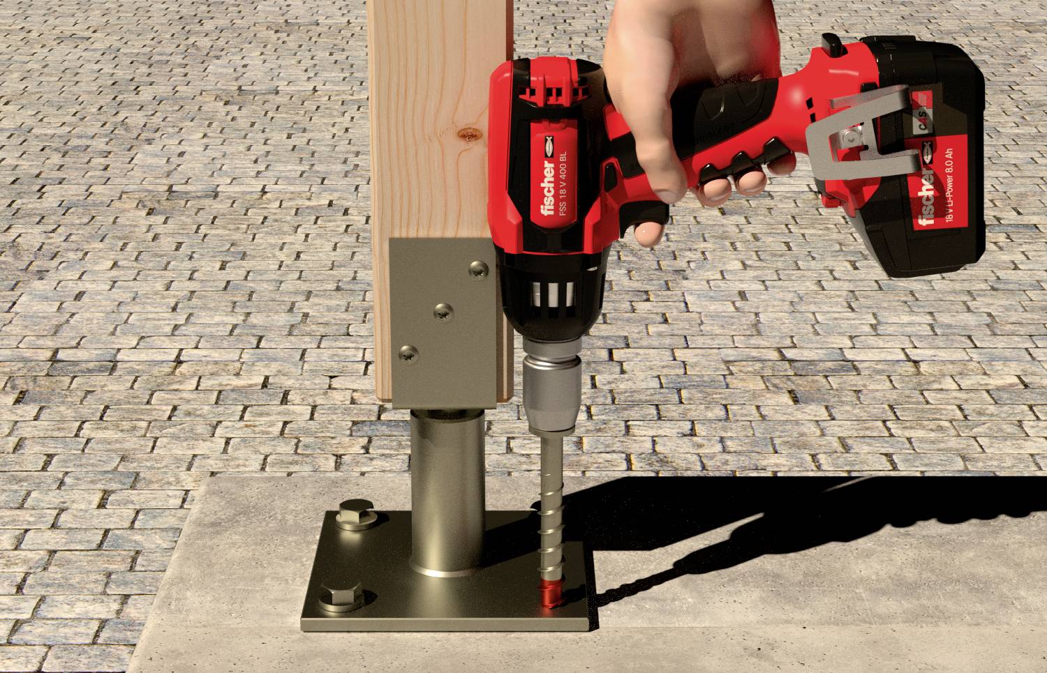 Jedna ręka trzyma czerwoną wiertarkę, która wwierca otwór w profilu metalowym przymocowanym do drewnianego słupa.