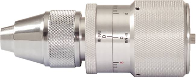 Srebrne narzędzie o ryflowanym uchwycie, skali pomiarowej i cylindrycznym kształcie. Używane do precyzyjnego ustawiania lub mocowania.