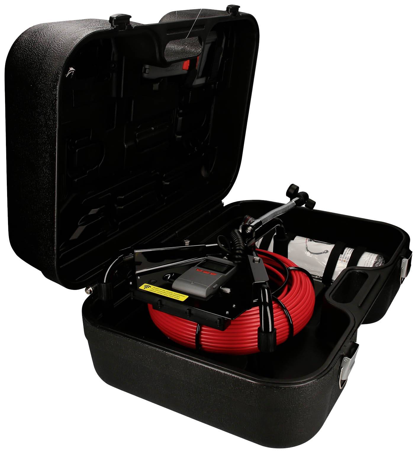 Czarny kufer z czerwoną rolką kabla i małym urządzeniem mechanicznym w środku, prawdopodobnie przeznaczony do celów inspekcyjnych.