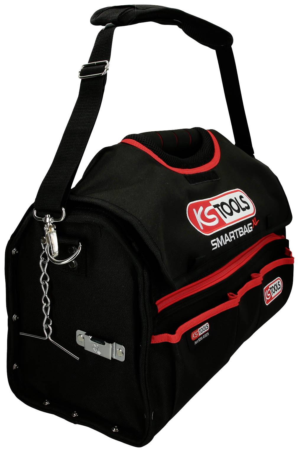 Torba na narzędzia wykonana z czarnej tkaniny, z czerwonymi przeszyciami i paskiem na ramię. Torba posiada boczne zamki błyskawiczne oraz zamek bezpieczeństwa z łańcuszkiem.